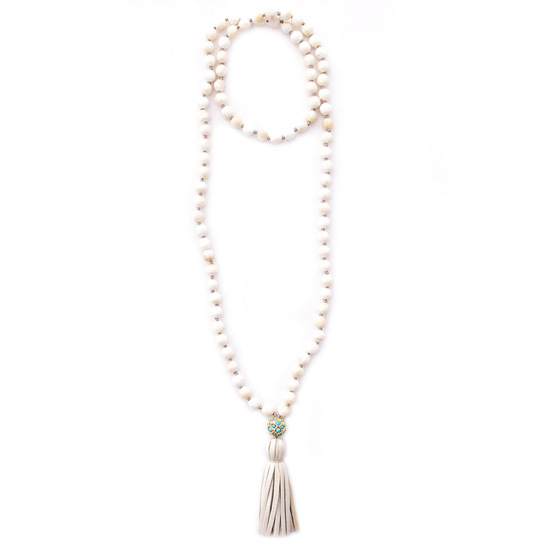 shell, turquoise ball & leather tassel