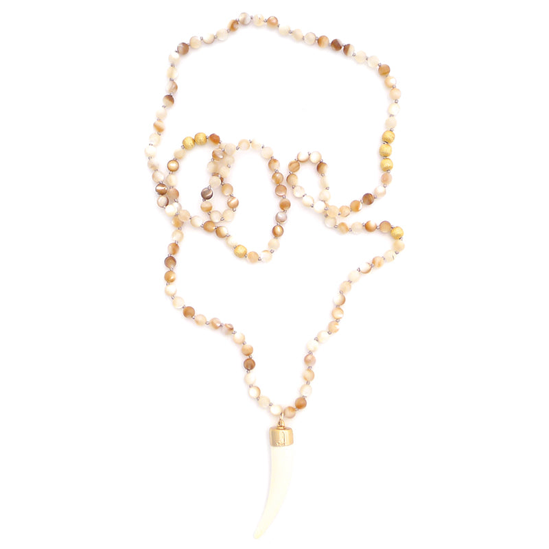 brown mother of pearl & bone tusk