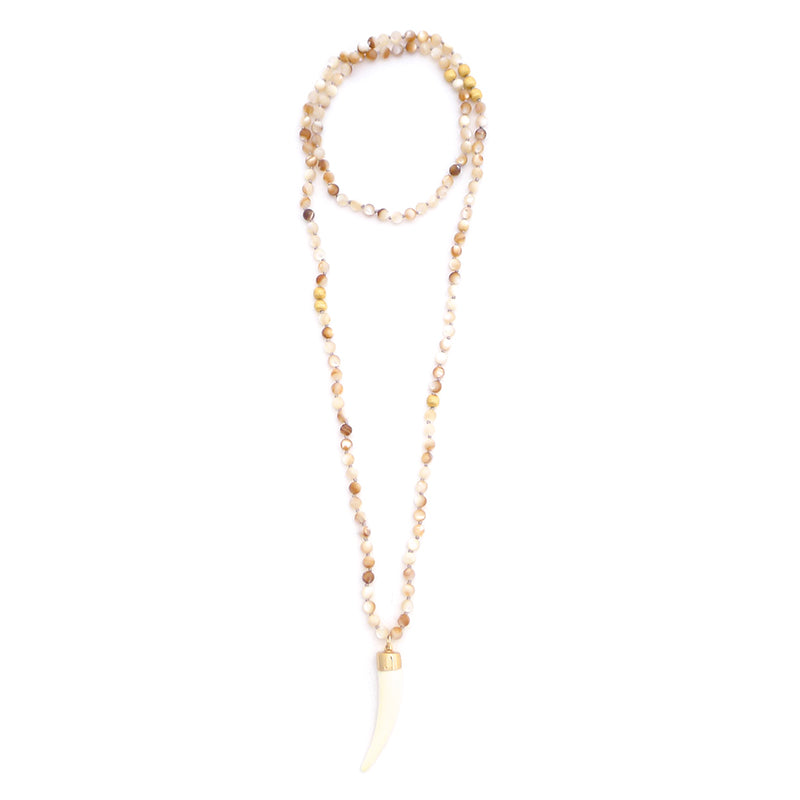 brown mother of pearl & bone tusk