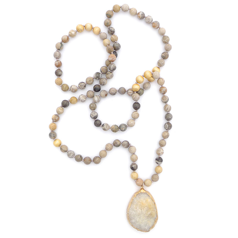 knotted fossilized coral & druzy