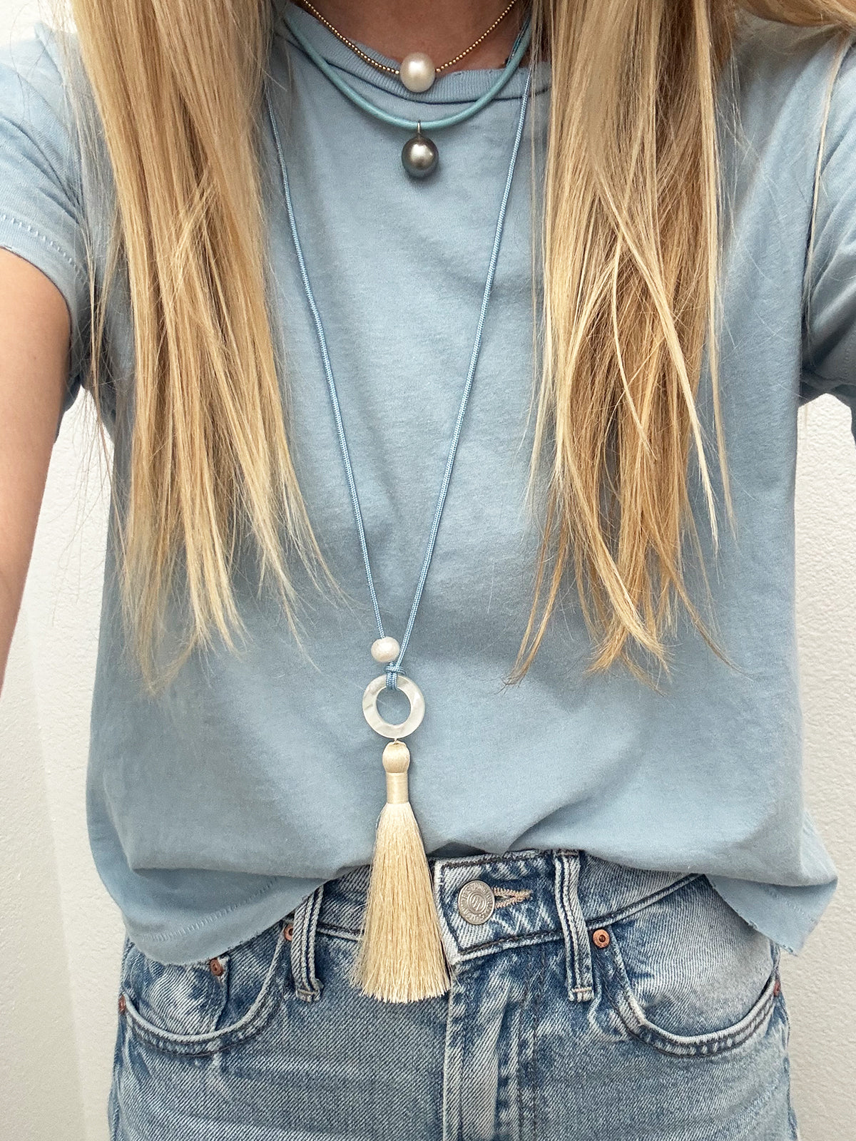 mother-of-pearl ring & silky tassel