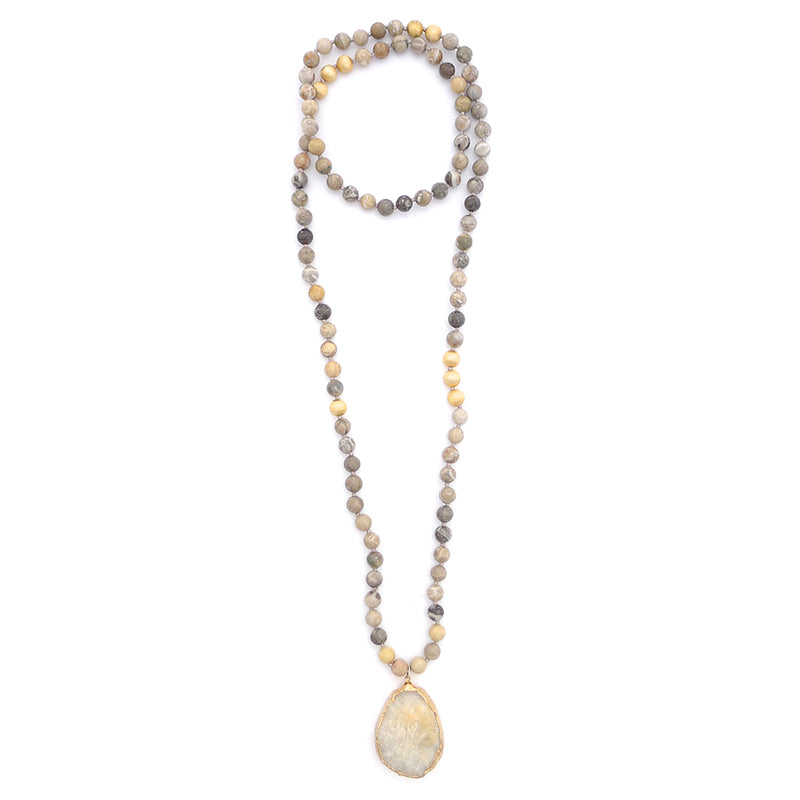 knotted fossilized coral & druzy