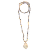 knotted fossilized coral & druzy