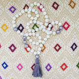 knotted mother of pearl & tassel