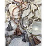 knotted mother of pearl & tassel