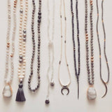 knotted mother of pearl & tassel
