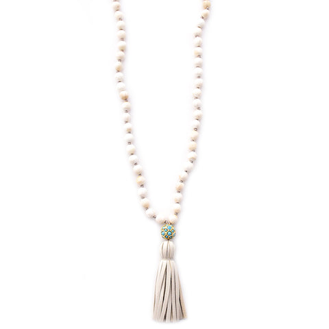 shell, turquoise ball & leather tassel