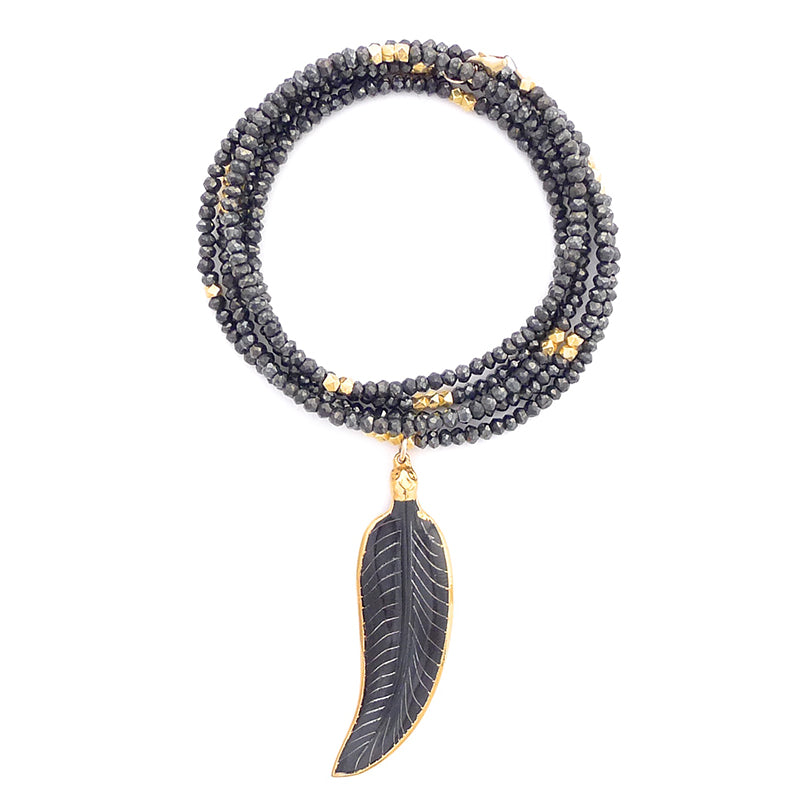 pyrite & bone feather