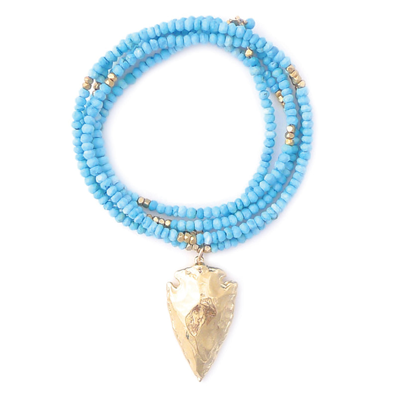faceted turquoise with gold arrowhead
