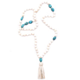 shell, turquoise nuggets & leather tassel