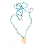 Kingman turquoise & large vermeil buddha charm